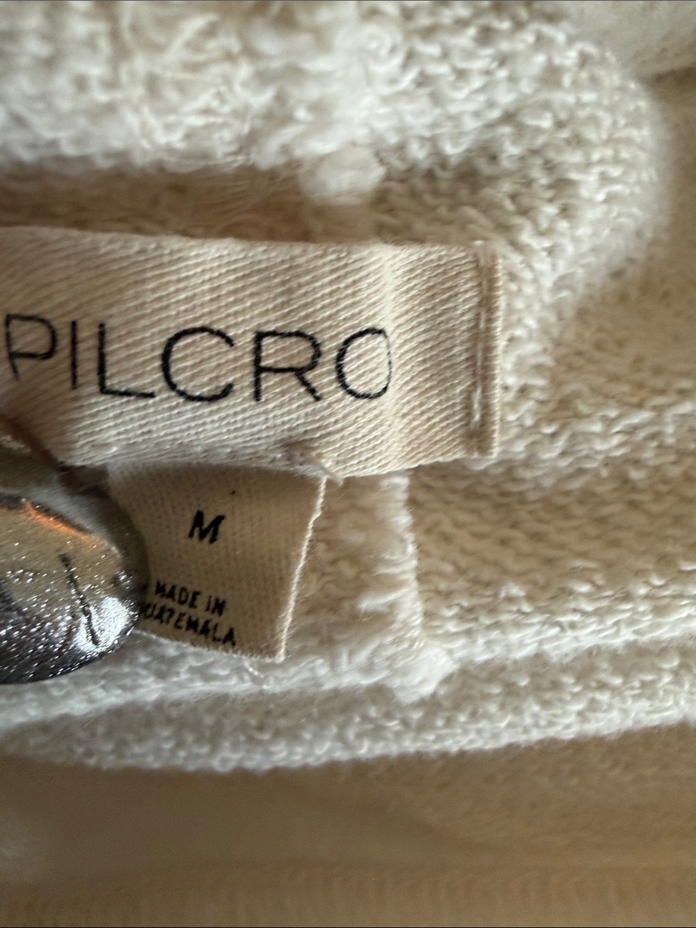 This cream Pilcro embroidered sweatshirt from Anthropologie features a "shimmer - Picture 8 of 12
